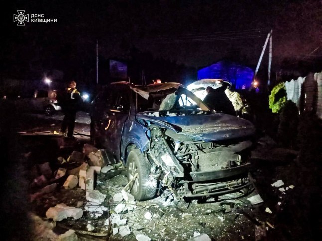 This handout photograph taken and released by the State Emergency Service of Ukraine on March 19, 2025, shows the wreckage of a car following a Russian strike in the Bucha district of Kyiv region, amid the Russian invasion of Ukraine. (Photo by Handout / STATE EMERGENSY SERVICE OF UKRAINE / AFP) / RESTRICTED TO EDITORIAL USE - MANDATORY CREDIT "AFP PHOTO / State Emergency Service of Ukraine " - NO MARKETING NO ADVERTISING CAMPAIGNS - DISTRIBUTED AS A SERVICE TO CLIENTS (Photo by HANDOUT/STATE EMERGENSY SERVICE OF UKRAINE/AFP via Getty Images)